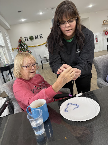 What Do Caregivers Do? Understanding Caregiver Responsibilities in Assisted Living Homes